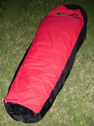 Long enough - The Bivy Sack is over 7 feet long with round panels at the head and foot. There is plenty of space, so you won't feel constricted. 