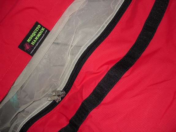 Opening of Bivy Sack - showing double zip mosquito netting and velcro closure for rain hood.